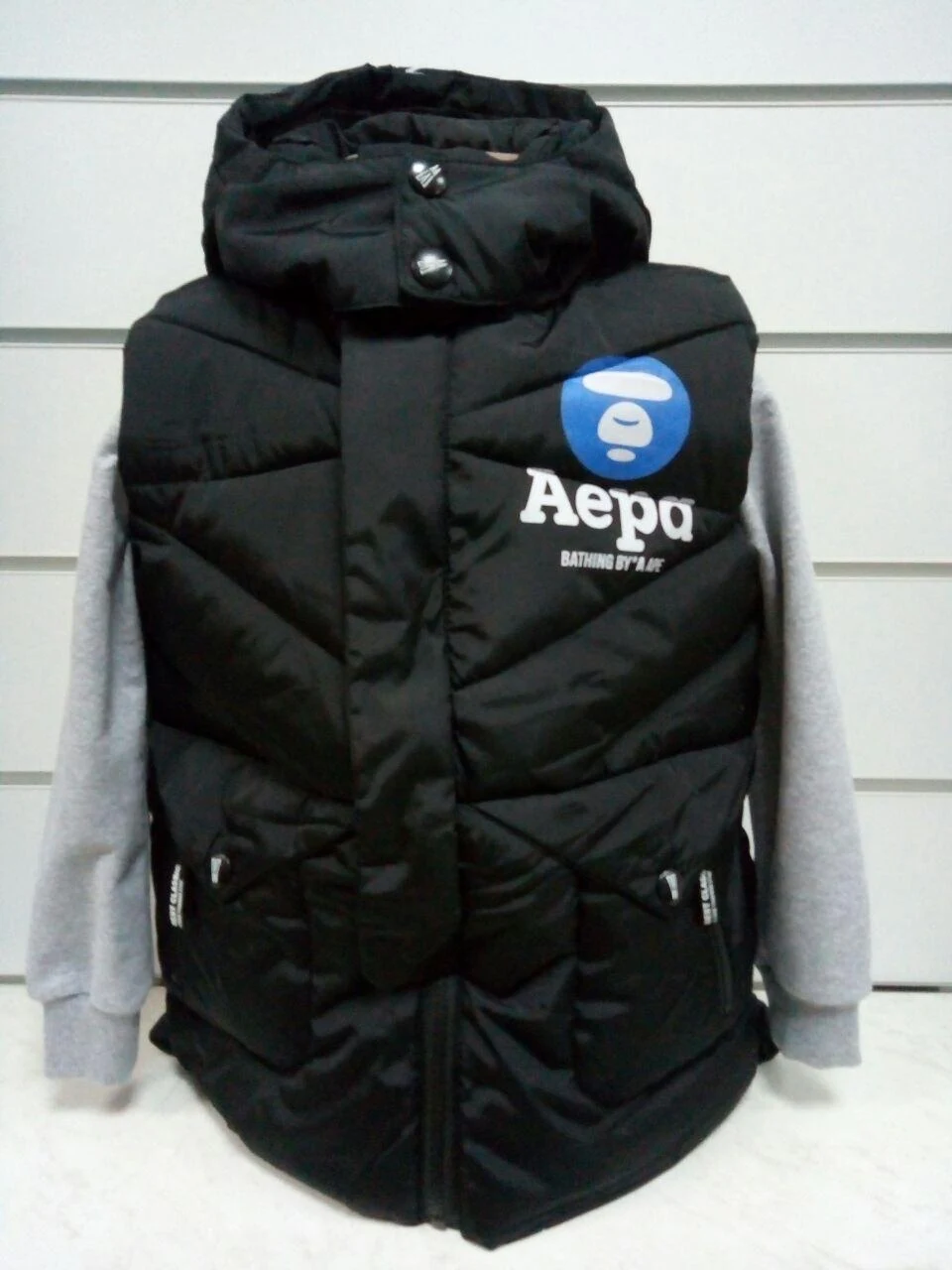 Vest for a boy on synthetic winterizer 1624